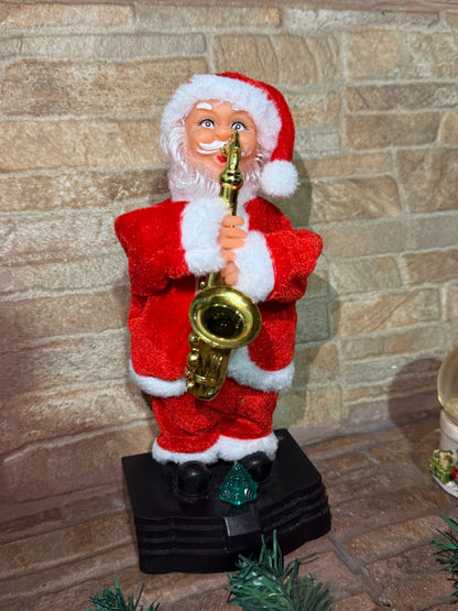 Papa Noel Saxofonista Luces, Sonido y Movimiento de 25 cm - 50% OFF y Envío gratis