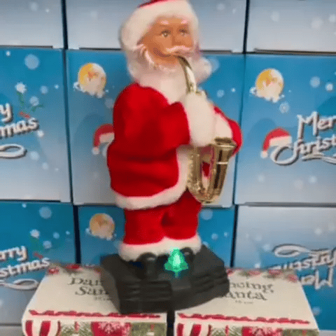 Papa Noel Saxofonista Luces, Sonido y Movimiento de 25 cm - 50% OFF y Envío gratis